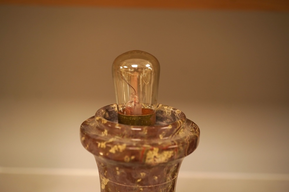 A serpentine lamp modelled as a lighthouse, 34cm high